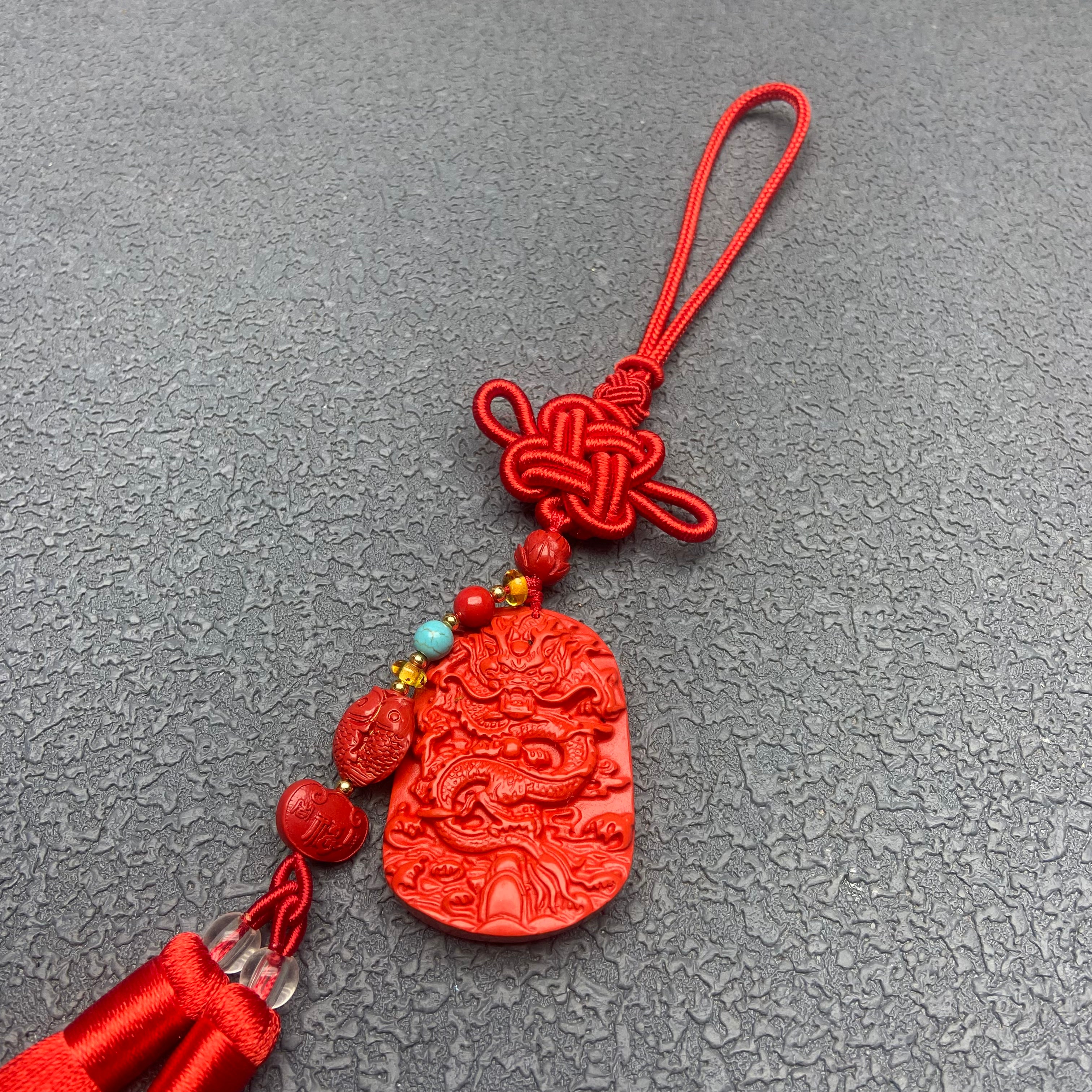 This Dragon Plaque, Double Fish & Ruyi car hanging ornament is a charming fusion of Chinese cultural symbolism and elegant design, bringing triple blessings to your journeys