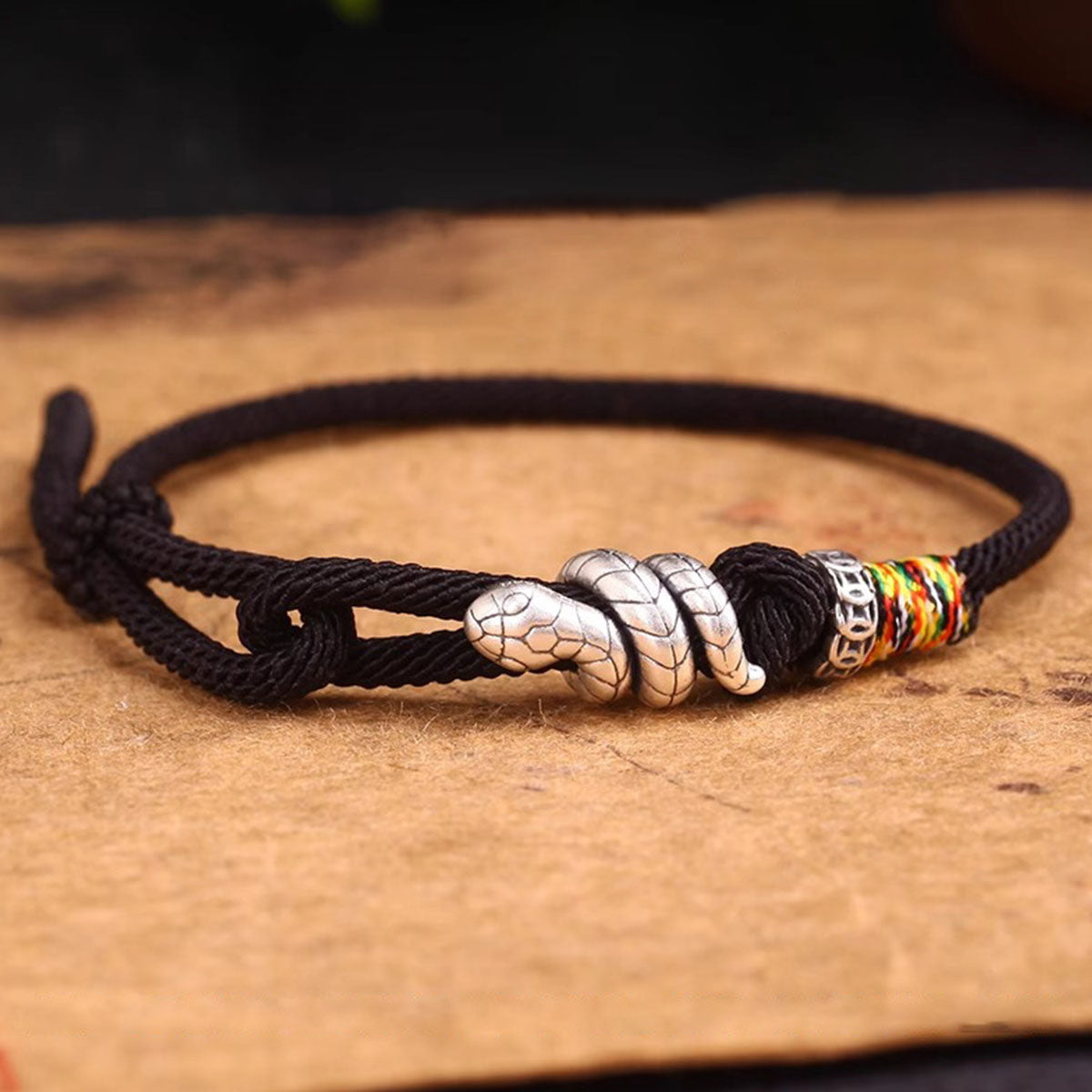 Snake Charm Bracelet - Red/Black Cord | Minimalist & Symbolic Hand Jewelry