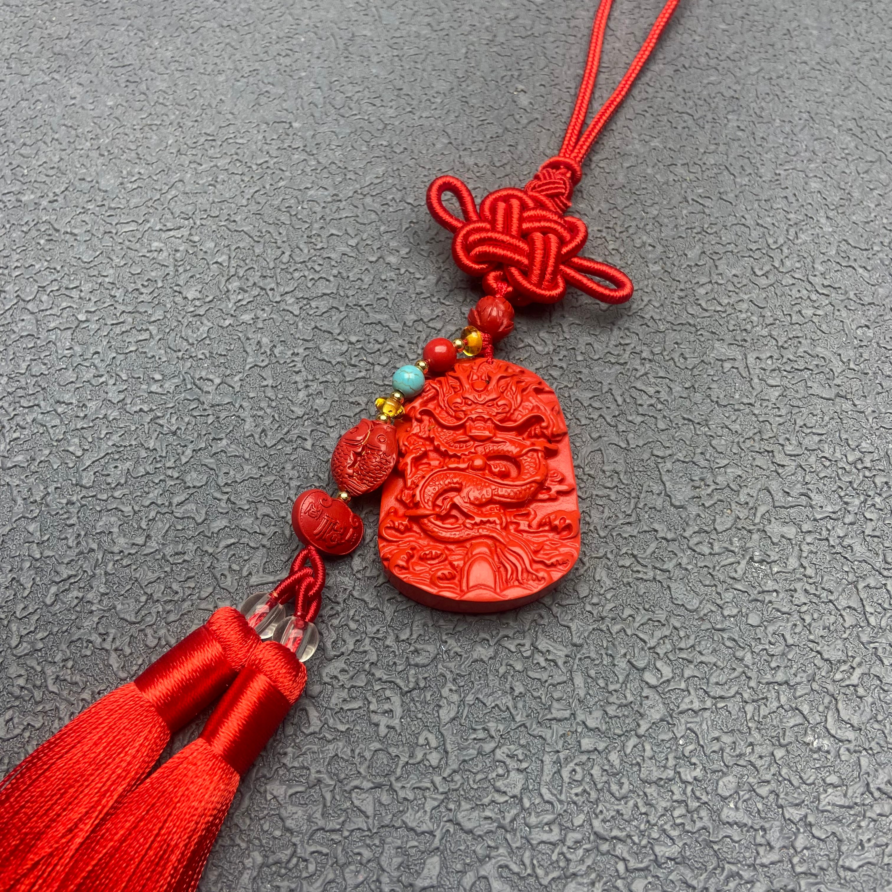 This Dragon Plaque, Double Fish & Ruyi car hanging ornament is a charming fusion of Chinese cultural symbolism and elegant design, bringing triple blessings to your journeys